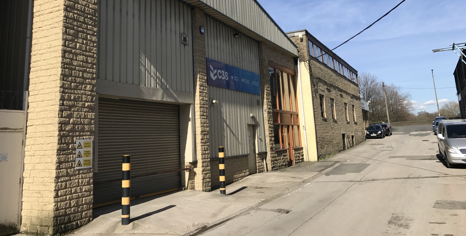 The property comprises two storey workshop accommodation with two storey offices of steel portal frame construction clad in artificial stone and uPvc coated steel decking beneath a uPvc plastosol coated steel decked roof incorporating perspex rooflig...