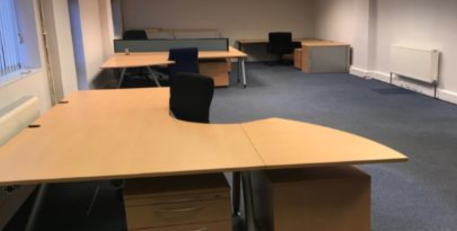 The property comprises a modern ground floor office suite with window frontage that comes fully furnished.<br><br>It is situated within Roy Trevor Removals Depot where allocated parking is provided for up to 6 vehicles.<br><br>WC, kitchen and boardro...