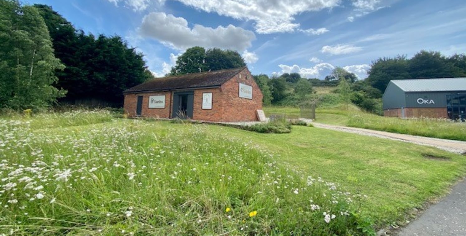 The property is currently an office and store.

Access is off the A4 through shared metal gates onto a shared tarmacadam and concrete drive. The property is on the left with a flat area of grass to the front, behind which is a single storey brick bui...