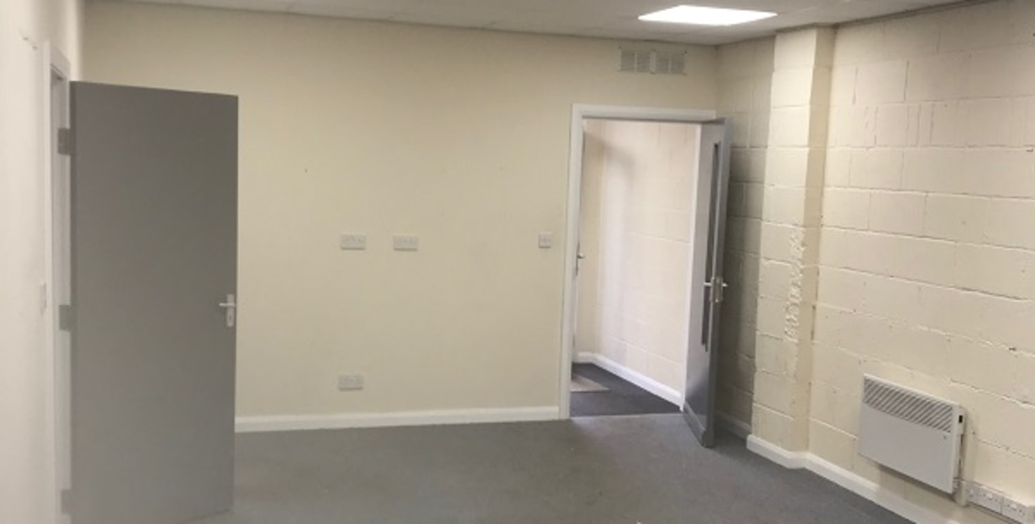 A single storey, steel framed workshop unit with brick elevations and set beneath a pitched and profile sheet roof covering.

Internally, the property is arranged over ground floor only to include a mix of well presented offices with small reception/...