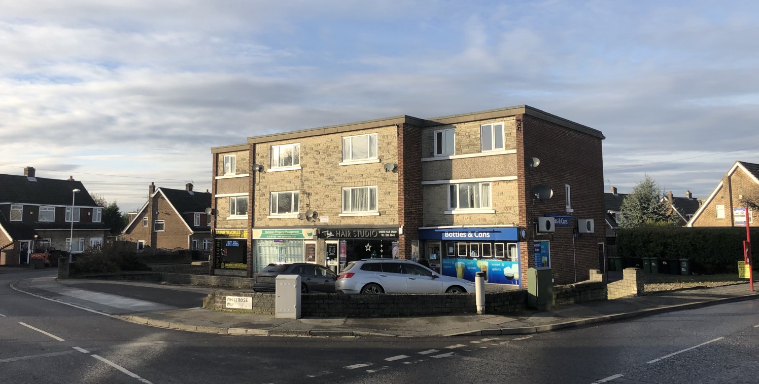 The property comprises a purpose built mixed use retailer and residential scheme arranged over ground and two upper floors. The four retail units provide regular shaped floor plates with ancillary and welfare accommodation to the rear. 

The six resi...