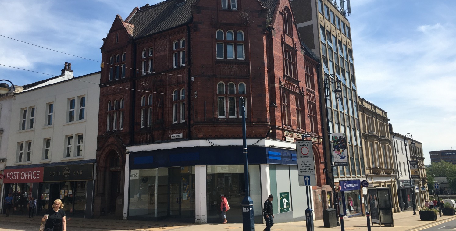 The unit is arranged over the ground floor and basement of an ornate, Grade II Listed, brick building. The ground floor comprises a main sales area, with glazed display windows to the front and side elevations, plastered walls, suspended ceiling with...