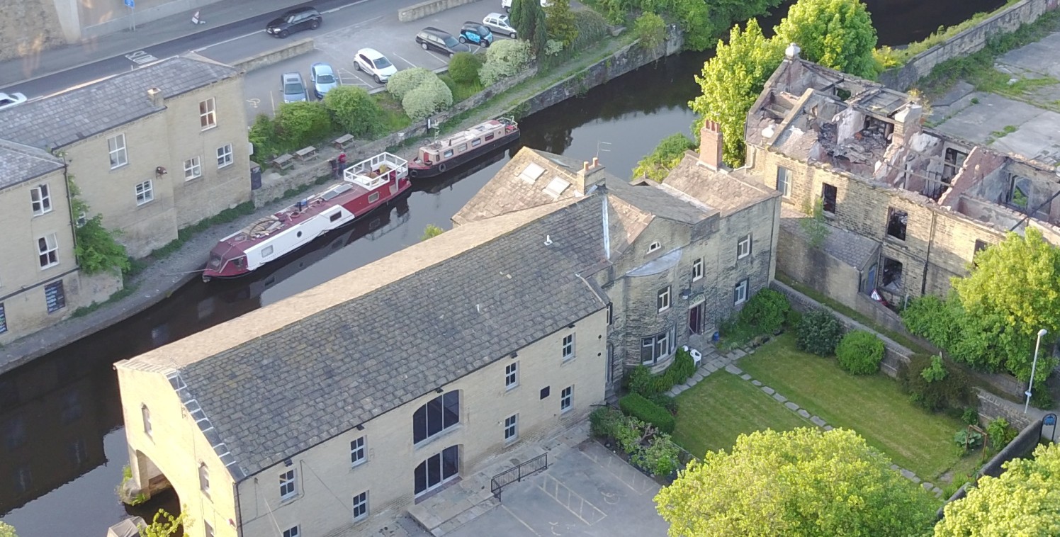 The property comprises a Grade II Listed former Canal moorings warehouse which has been sympathetically restored and converted to provide high grade office accommodation overlooking the Calder & Hebble Navigation Canal. The principal building provide...
