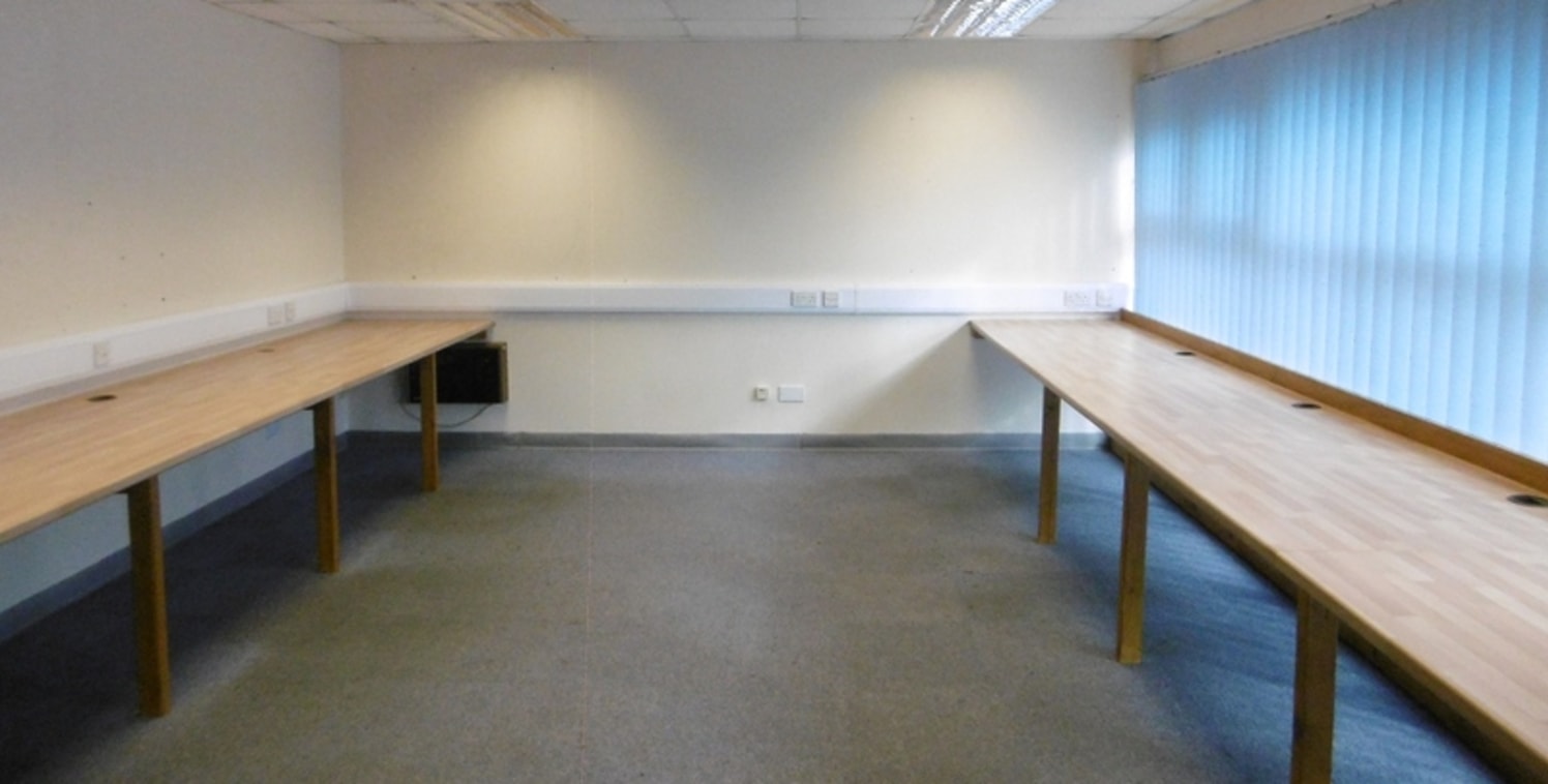 The property comprises a modern trade counter/industrial premises providing offices and warehouse. A single storey office with lobby, kitchenette and WC facilities is provided to the front of the unit with industrial area to the rear and roller shutt...