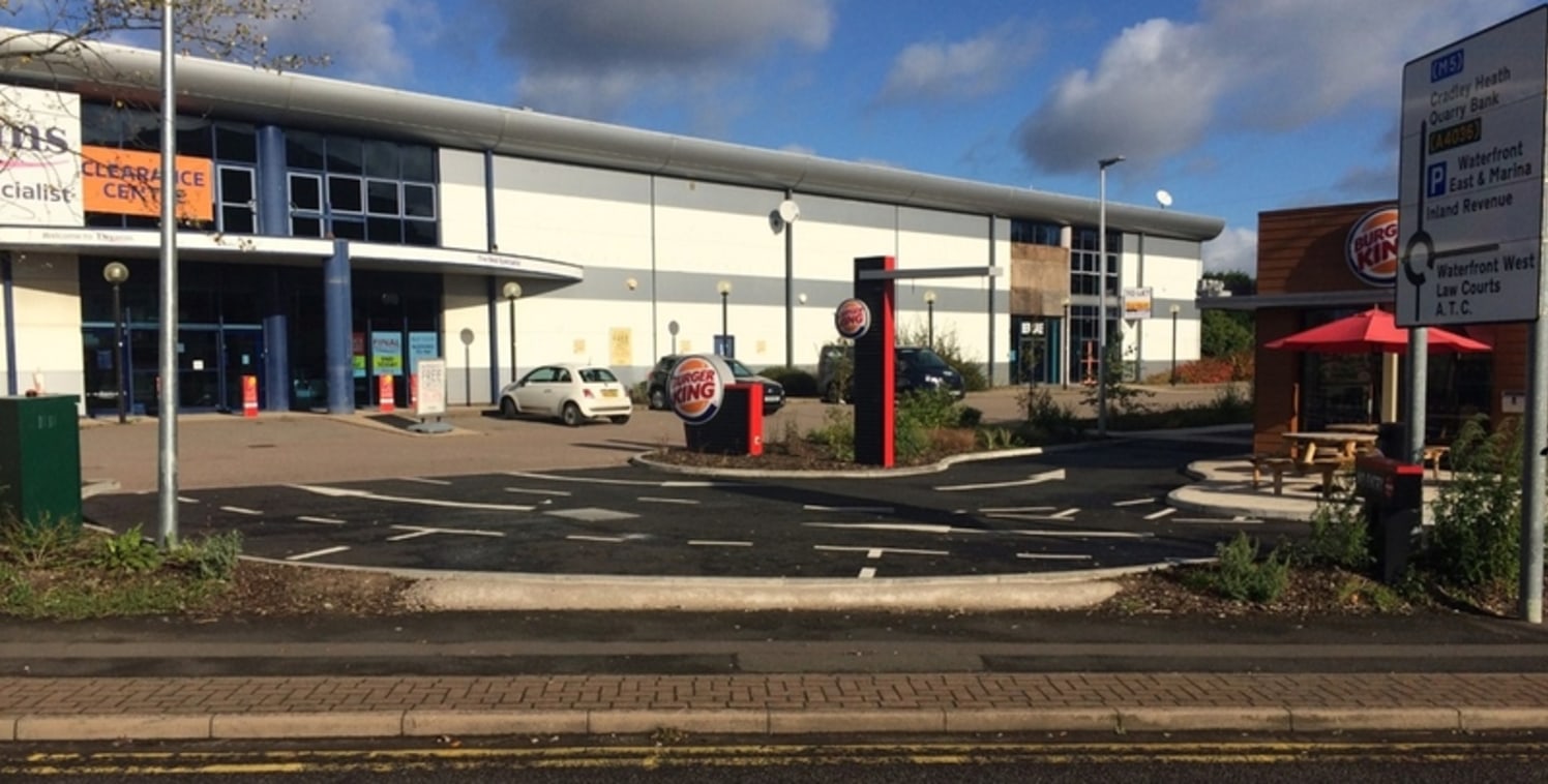 The property currently comprises three single storey retail warehouse units with glazed elevations and roller shutter doors. The scheme is to be extended to provide an additional two high quality, retail units in addition to the recently built drive-...