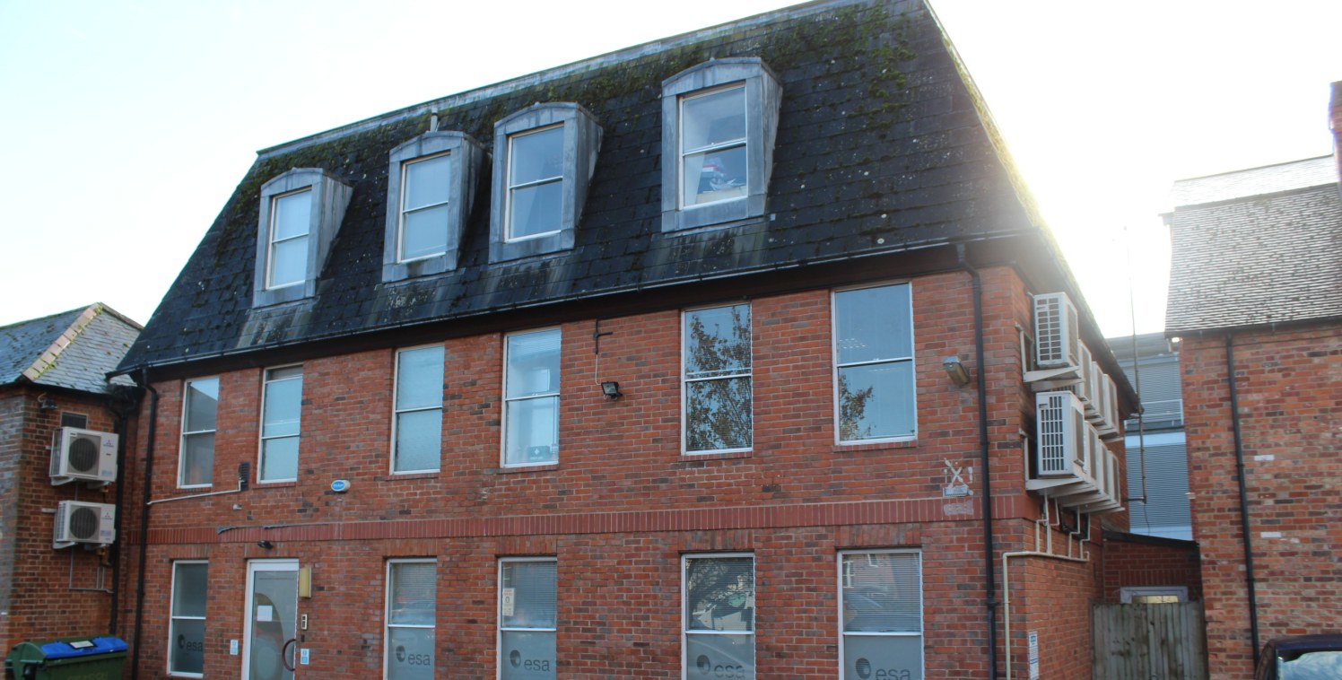 1 The Pentangle comprises a self contained office building, constructed in the mid 1980's. The property is constructed over ground, first and second floors. The building is of brick construction with a pitched mansard style roof with slate covering....