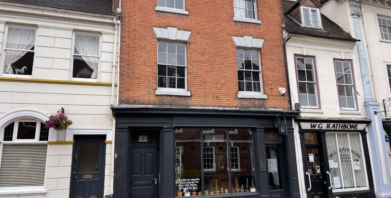 Attractive Grade II Listed period building, retail at ground and first floors, ancillary accommodation with basement, second and third floors.