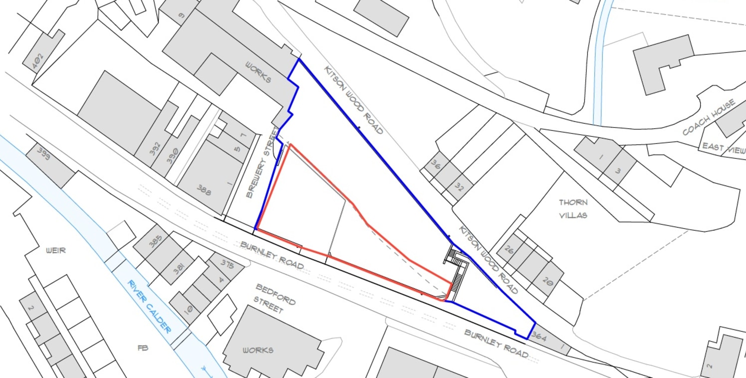 The property briefly comprises an area of land predominantly utilised as a car park. The site is broadly triangular is shape and is currently split between an area of hard surfaced yard and woodland. It is largely of a relatively level topography thr...