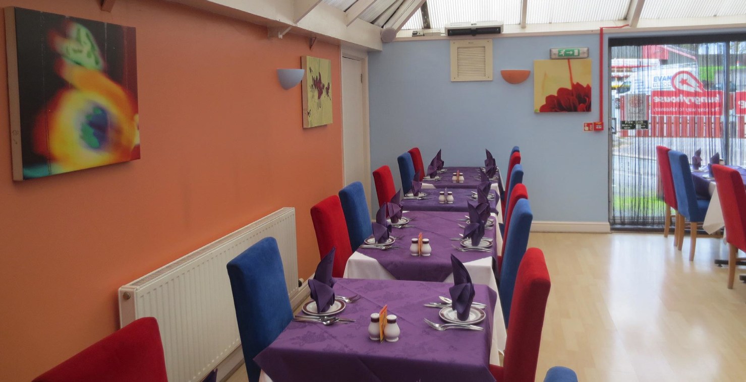 The property comprises a three story attached building with a single story rear projection . The accommodation is arranged as a restaurant on the ground floor, with residential and ancillary accommodation on the upper two floors and a basement store....