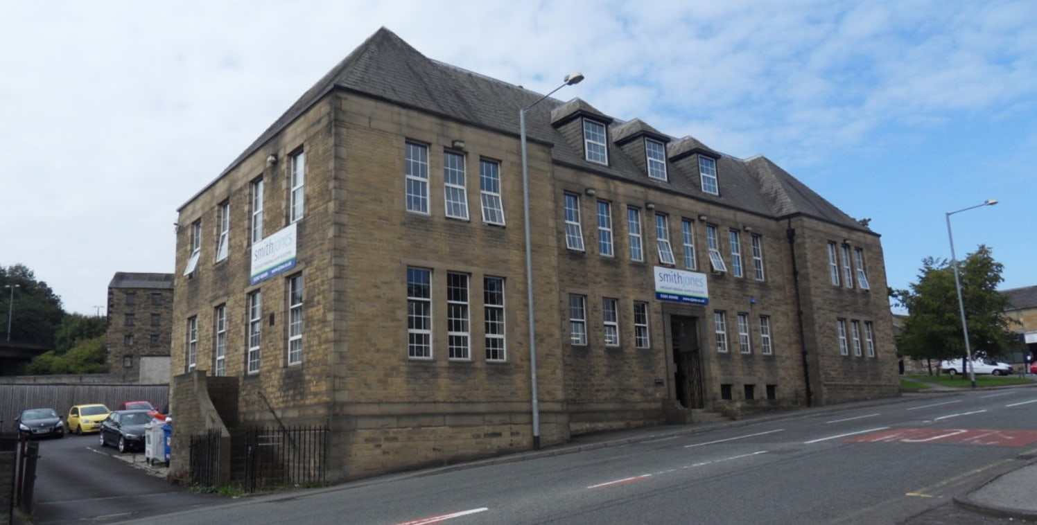 LOCATION\n\nSituated at the edge of Burnley town centre and prominently positioned fronting Finsley Gate, close to its junction with Manchester Road and approximately 1½ miles from Junction 8/9 of the M65.\n\nThe building is at the edge of the Weaver...