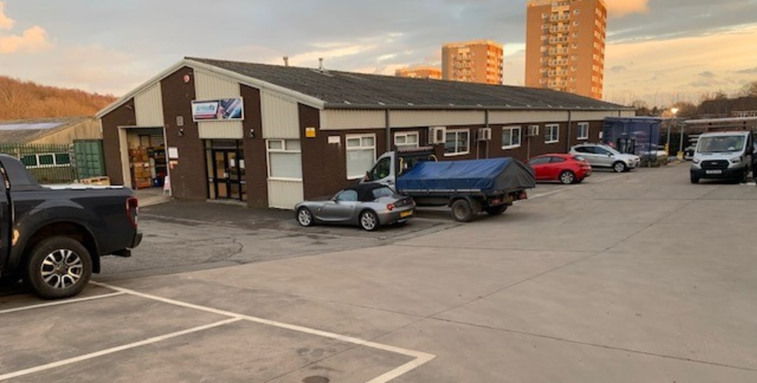 The property comprises a steel portal frame industrial unit with a pitched cement sheet roof, part brick and part clad walls and a concrete floor. Loading to the warehouse is by a ground level roller shutter door to the front elevation and a dock lev...