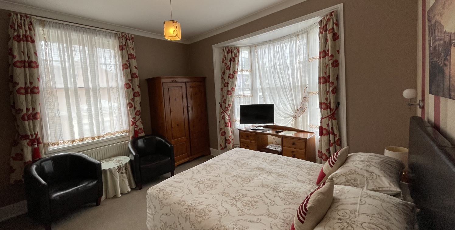 Town centre former hotel, 14 bedrooms and ancillary lounge, bar, dining room, kitchen, potential manager's accommodation, utility rooms, and on site car parking.