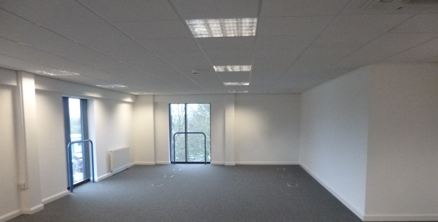 The property comprises a purpose built office block with accommodation on ground and three upper floors with composite cladding elevations beneath a pitched profile steel sheet roof. The property benefits from air cooling, suspended ceiling incorpora...