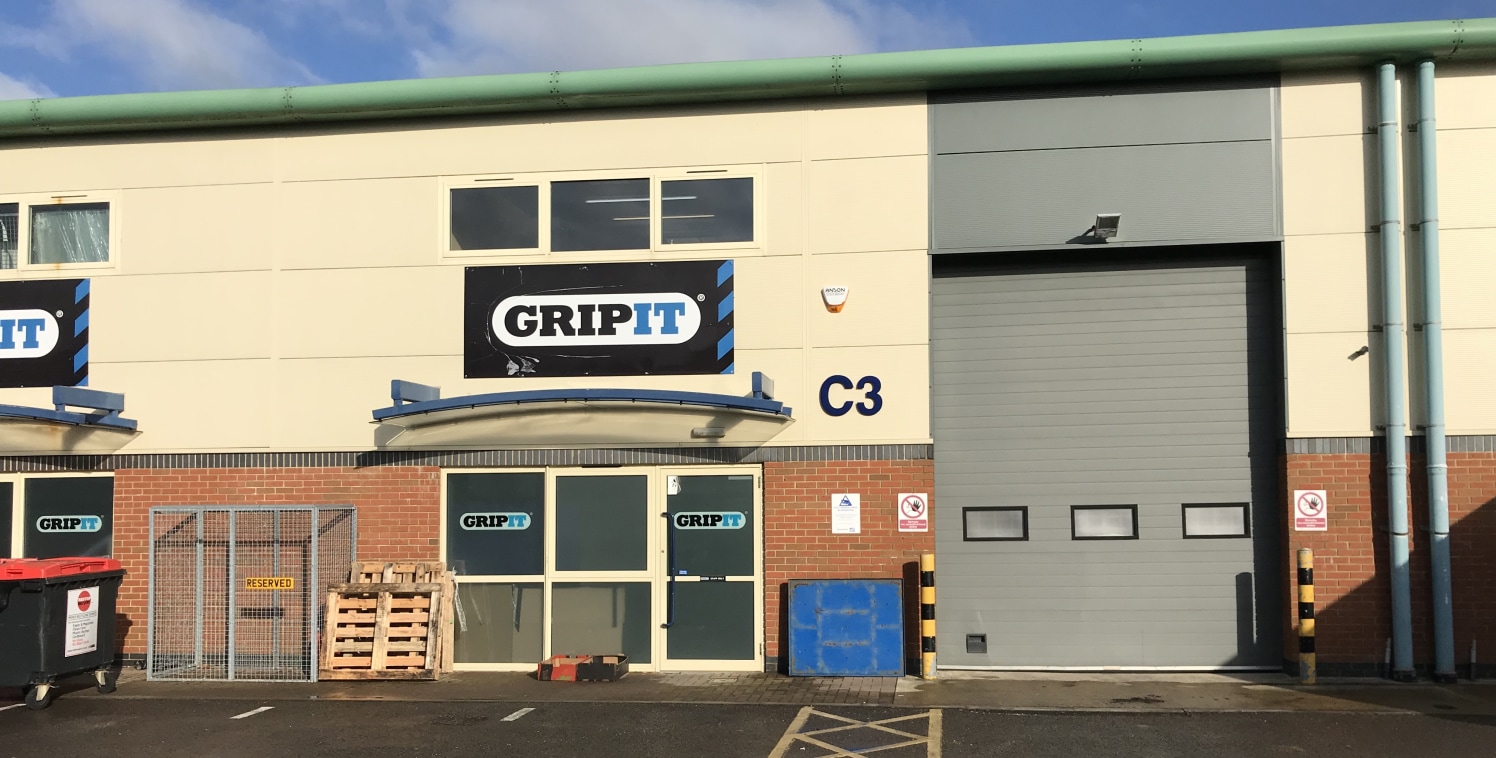 The property comprises a mid-terrace modern steel portal frame industrial/warehouse unit with a high quality specification to include internal blockwork and external brickwork to lower elevations and insulated cladding, up to 6m eaves under an insula...