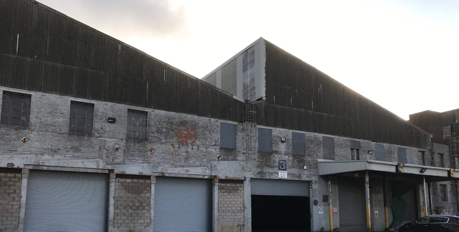 The premises forms a large industrial/warehouse which provides excellent storage/production space benefitting from the following specification:

* Average Clear Headroom 9.5m (31ft)

* Solid Concrete Floor

* Drive in roller shutter loading doors

*...