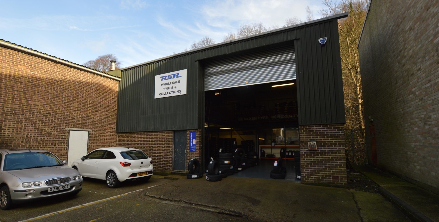 The property is of blockwork construction with corrugated sheet roofing under a portal framed warehouse.

The main unit has ground and first floor offices and benefits from two concertina loading doors to the front of the premises and an up and over...