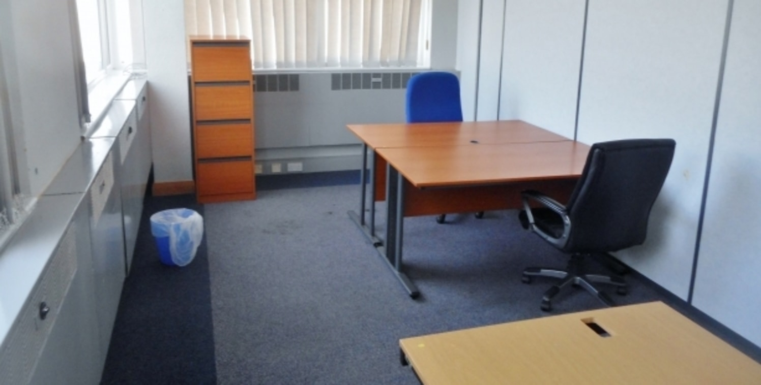 The property comprises serviced office accommodation within a modern two-storey office building operated by APT Solutions Limited. It benefits from extensive on site car parking and secure perimeter fencing....