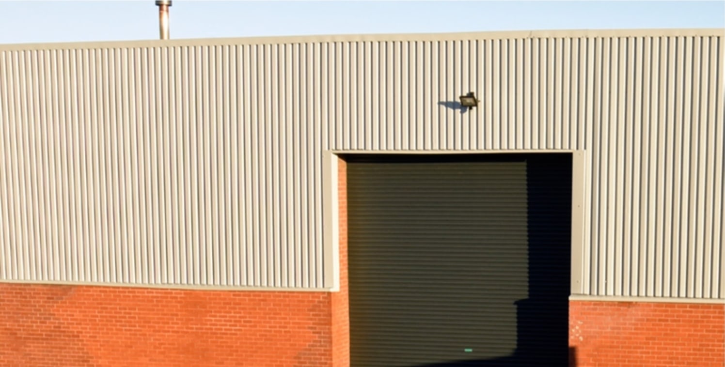 The newly refurbished industrial unit of steel portal frame construction with brick/block and part clad elevations surmounted by a pitched roof incorporating translucent roof lights. The warehouse area benefits from a painted concrete floor, lighting...