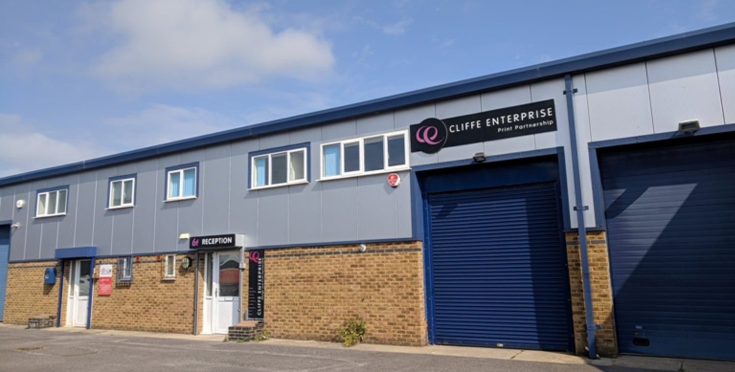 The premises comprise a modern mid terrace self-contained warehouse and office building of steel portal frame with brick/ block elevations and smooth finish insulated cladding under a pitched insulated roof. The ground floor provides workshop/stores....