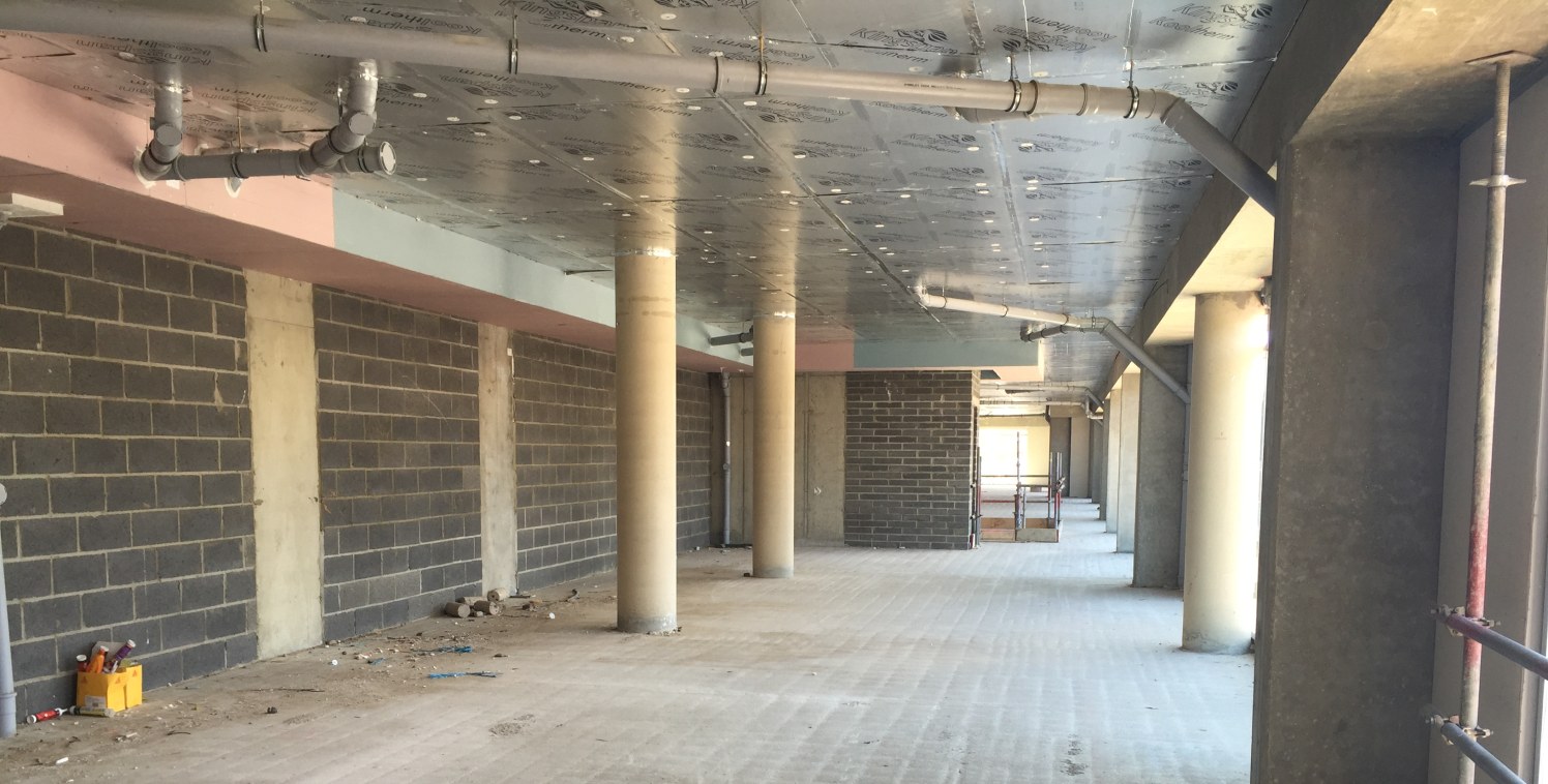 The commercial space is arranged over ground and first floors providing open plan accommodation throughout finished to a

developers shell conditioning, including concrete screed floor, breezeblock walls and concrete slab ceiling, with capped off ser...