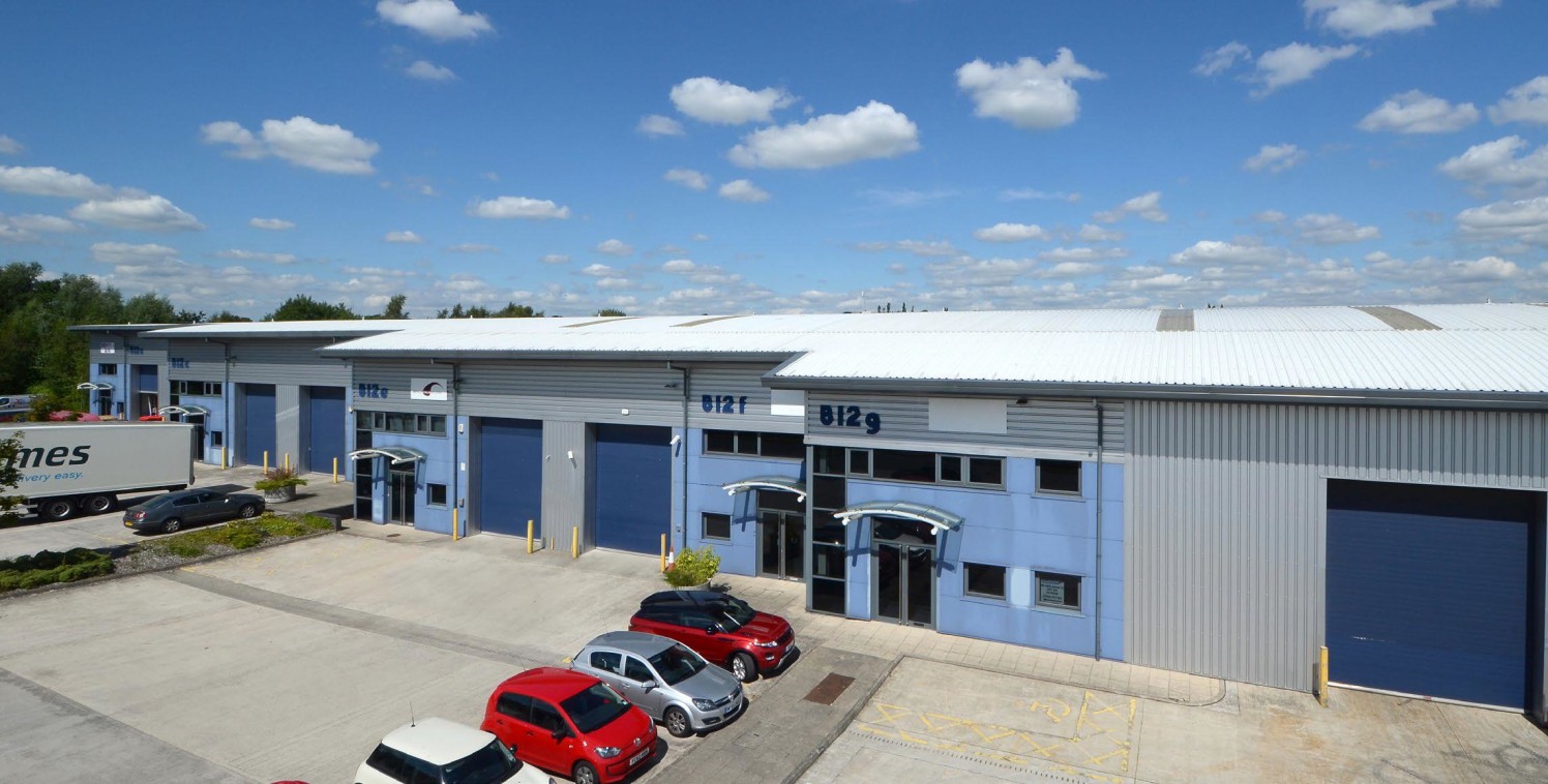 Drive in loading doors. 50kN/sq m floor loading. Eaves height 5.5m. Large concrete loading apron. Consent for B1(c), B2 and B8 uses. Fully fitted office. Cat II lighting. Perimeter trunking. Dedicated car parking.