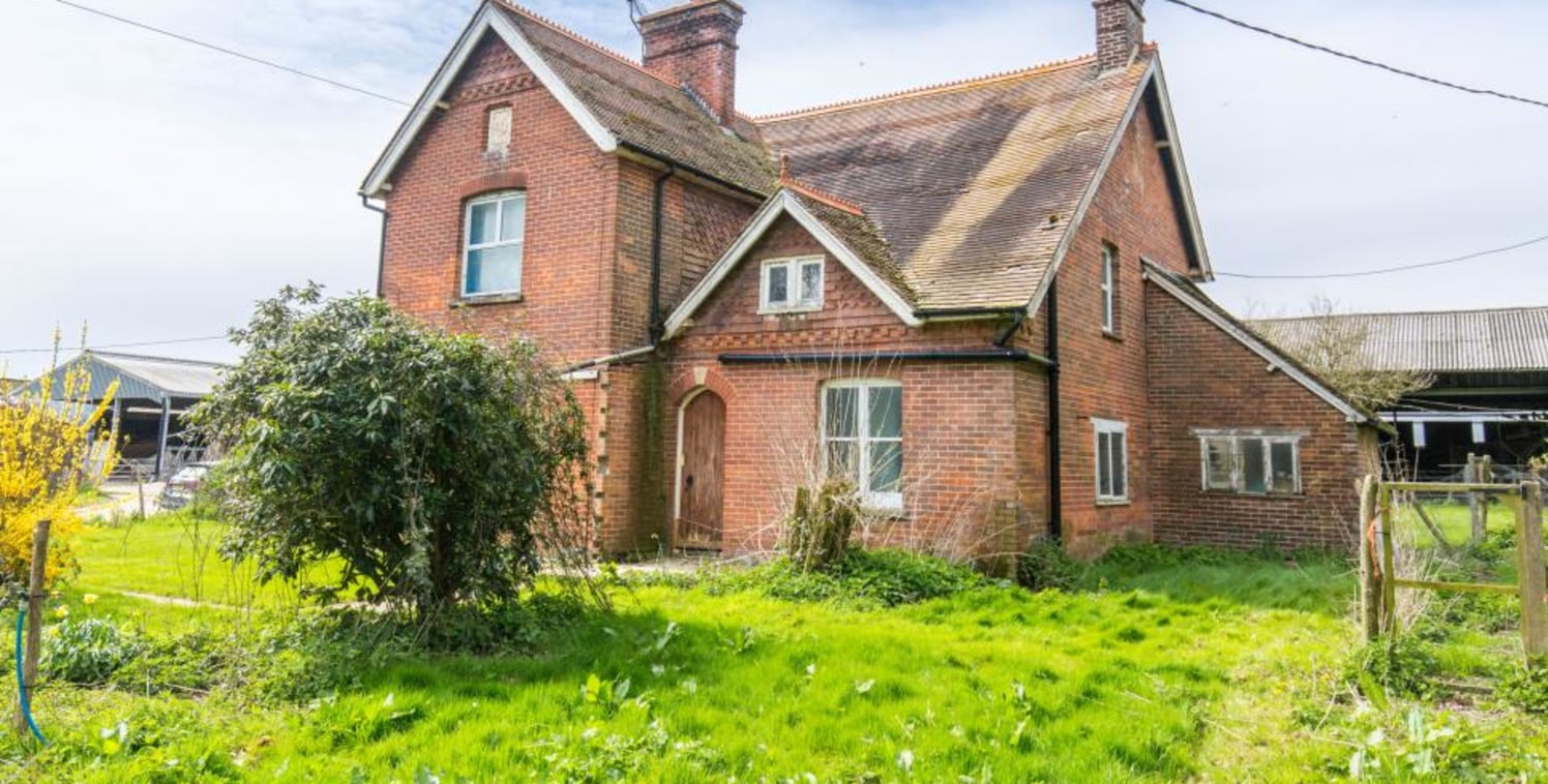 Residential smallholding with a Victorian farmhouse, pasture, woodland and an agricultural outbuilding. In all about 10.4 acres.