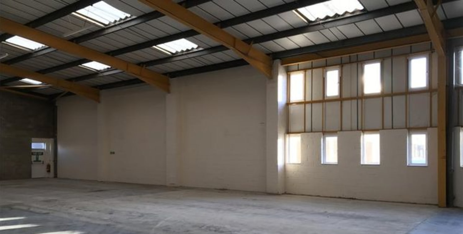 Two modern units providing clear span warehousing, with two roller shutter doors per unit under a pitched roof. Benefits include translucent roof light panels, fluorescent strip lighting, male and female wc's. The property has an eaves height to the...