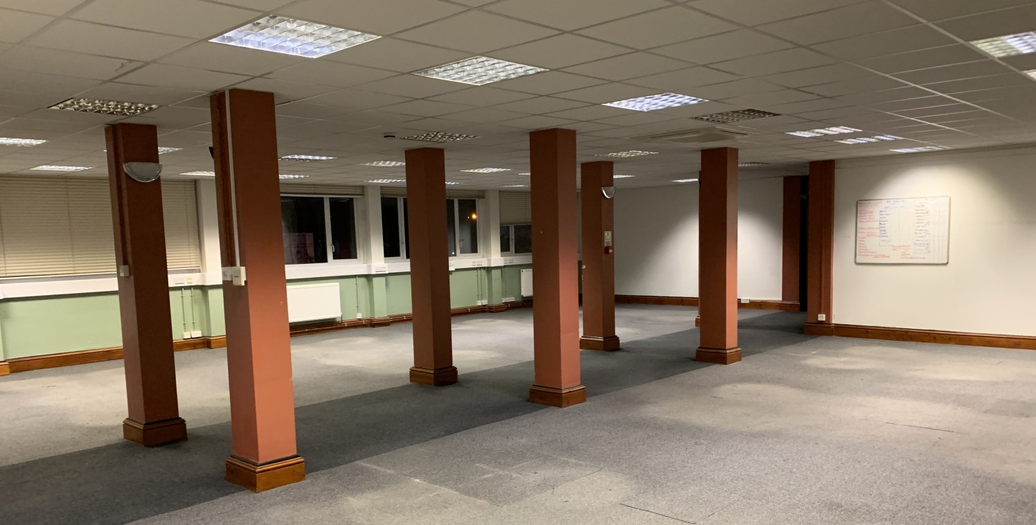 This first floor office suite currently provides predominantly modular office rooms formed by way of stud partitions with some areas open plan and includes kitchen and WC facilities. There is a reception area to the ground floor. 

This site benefits...