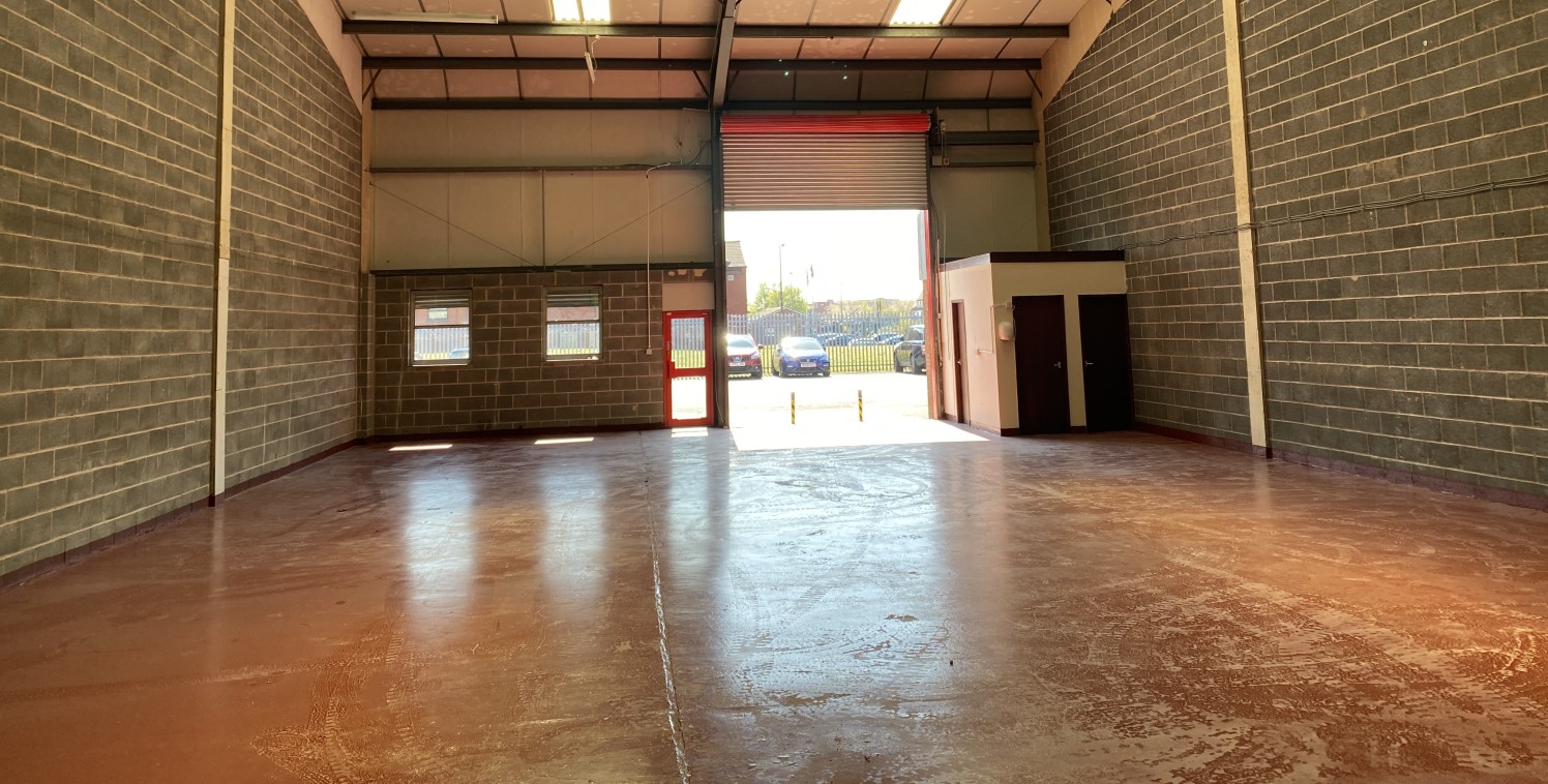 The property comprises a recently refurbished, steel portal frame, mid-terraced trade counter/workshop unit extending to approx. 247.35 sq m (2,662 sq ft).

Internally, the property provides for open-plan workshop and warehouse accommodation, togethe...