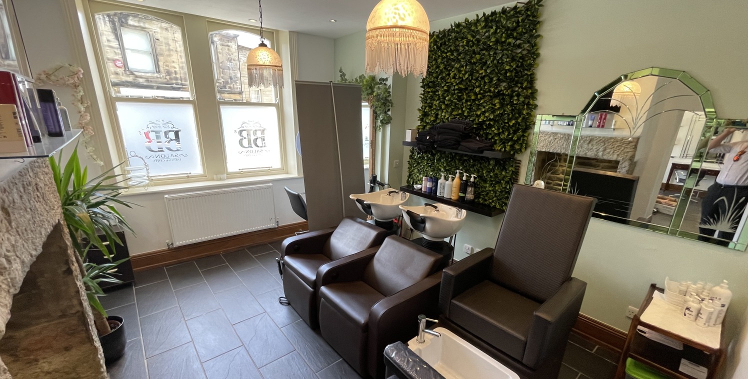 The premises comprise the ground floor and part first floor of an atractive stone building. The ground floor accommodation forms an extremely well presented salon, with glazed display window, tiled flooring, feature lighting, kitchen and toilet facil...