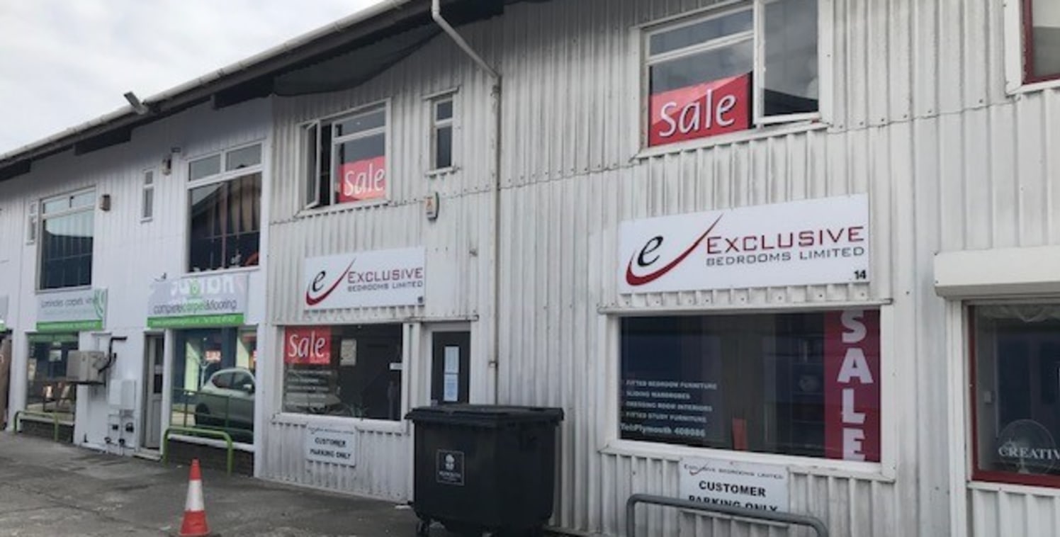 The premises comprise a double ground floor retail unit with additional space and staff facilities located on the first floor. The lease includes a right to park 2 vehicles.