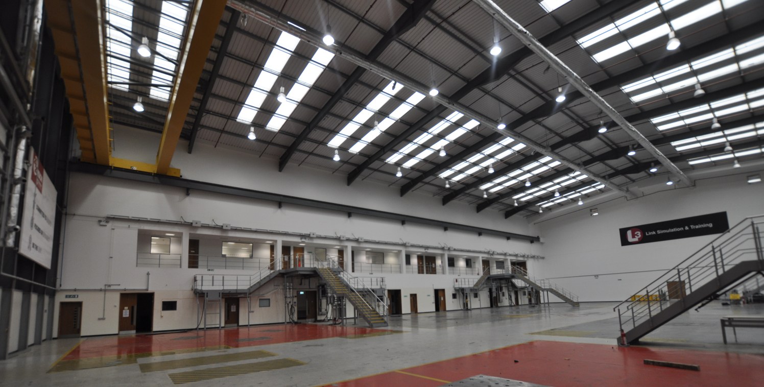 * Ground floor warehouse on secure facility

* Allocated car parking

* To be completely refurbished

* Previously used as aircraft simulator hall