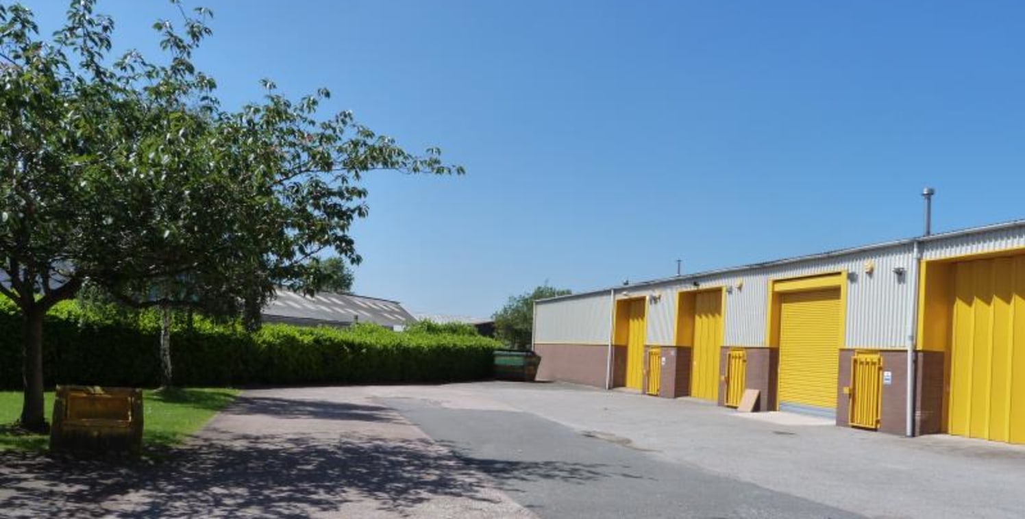 The units consist of warehouse/workshop space with an eaves height of 4.8m, concertina doors to a shared yard, offices and WCs. There are parking facilities to the front and rear of most units....