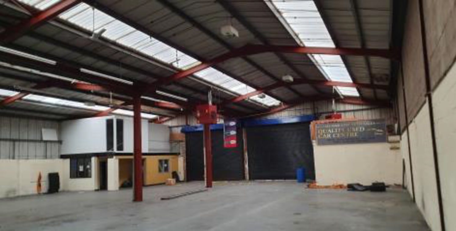 The property comprises of a single storey, two bay warehouse of steel portal frame construction surmounted by a pitched insulated roof incorporating translucent roof lights.\n\nThe property benefits from two large roller shutter entry doors (4.96m x...