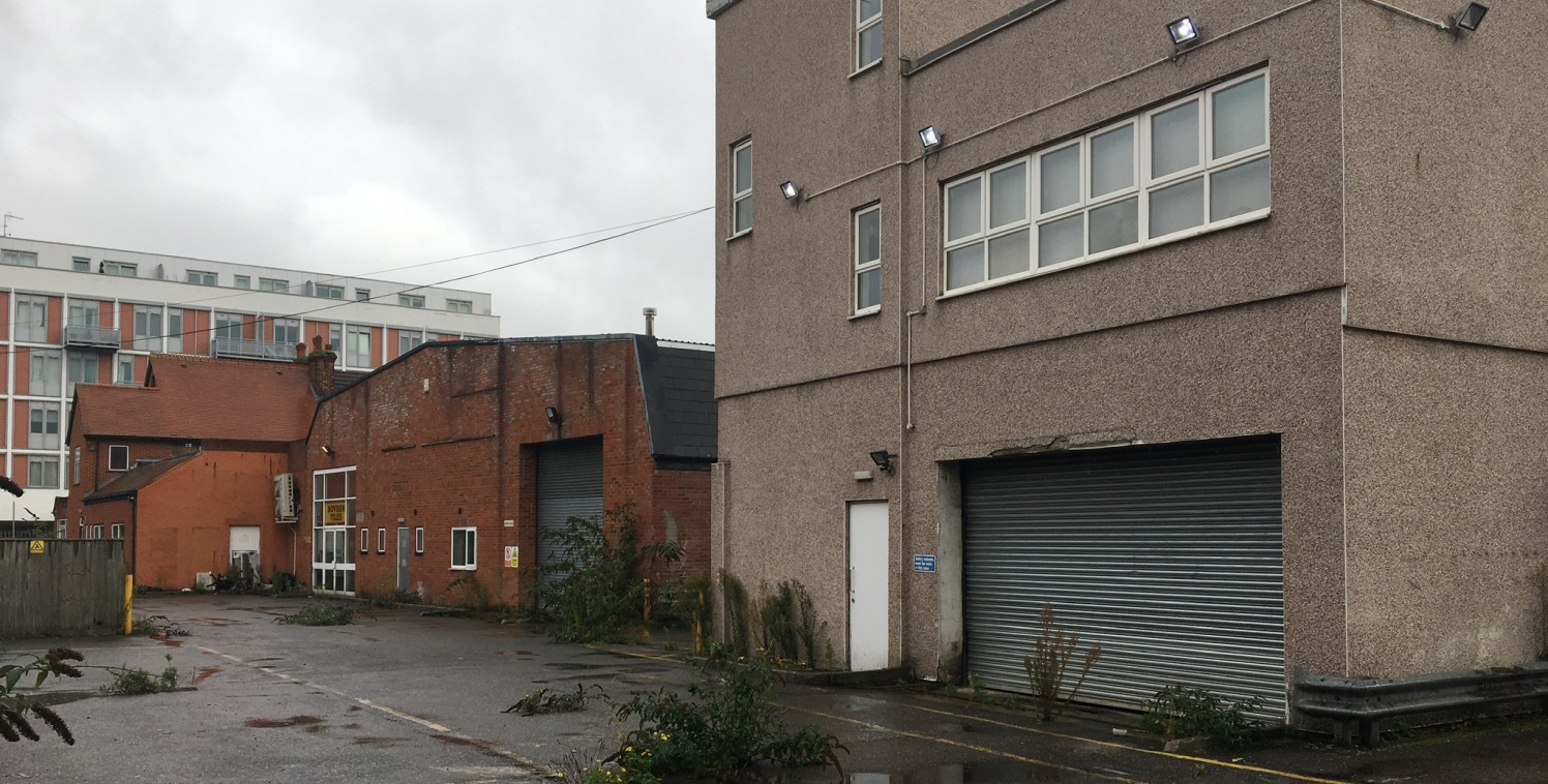 The site totals approximately 1.01 acres (0.41 hectares) and consists of an existing warehouse and office accommodation with a showroom to the front of the site.