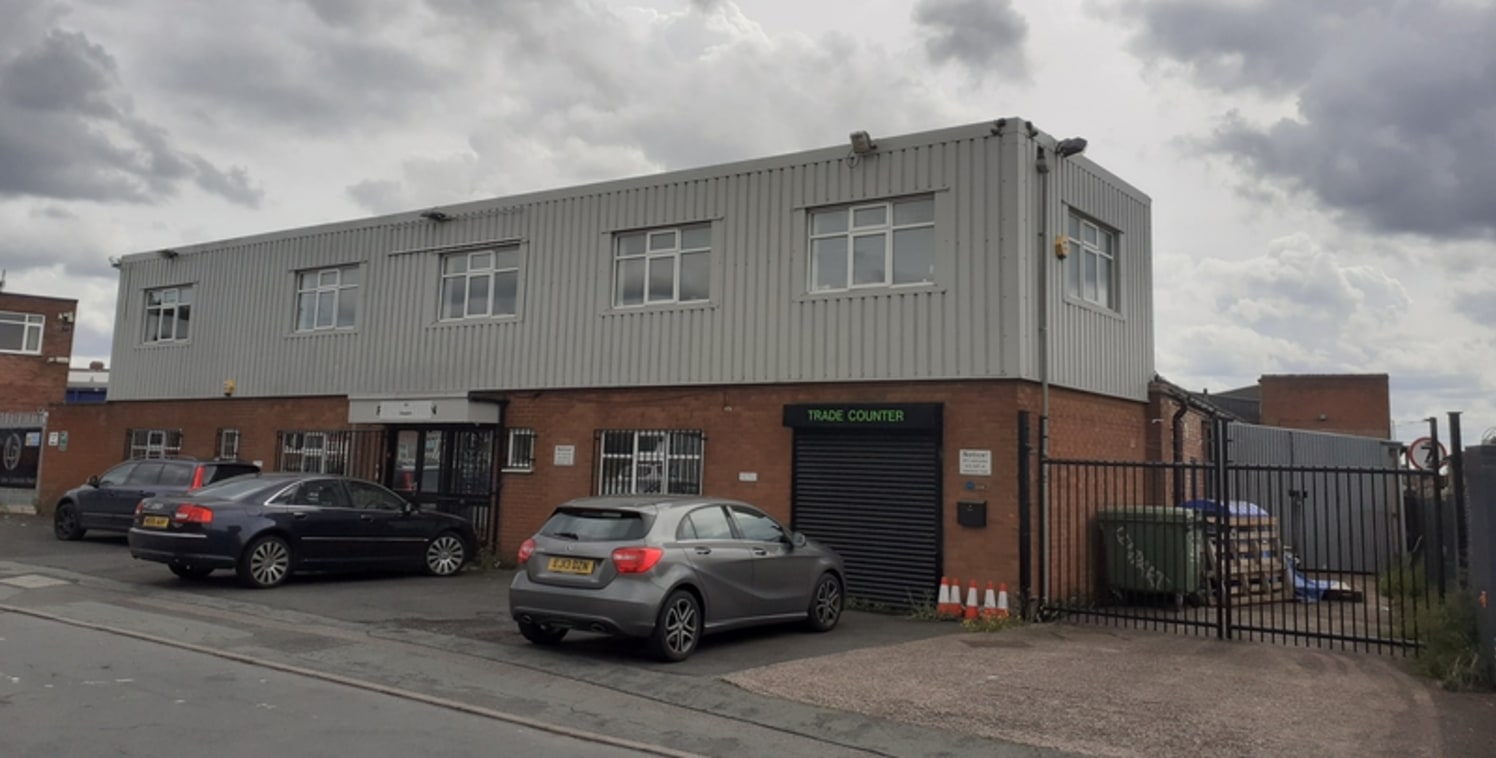 The premises comprise an industrial building consisting of two bays to the rear with two storey offices to the front. The property benefits from yard space to the side and car parking to the front....