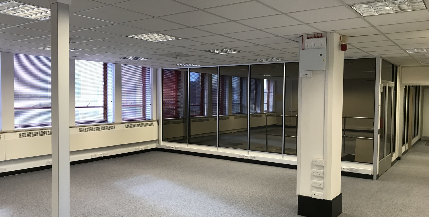 The property comprises a 1960s office building built in two wings with lower and upper ground floor retail units and offices on upper floors.

The office accommodation benefits from refurbished common parts and two passenger lifts and is DDA complian...