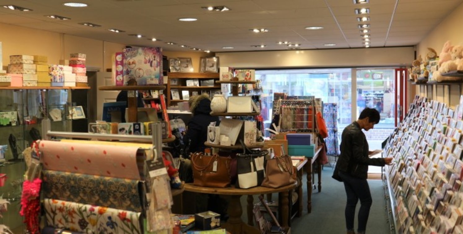 The premises comprise a prominent self-contained, open-plan ground floor shop located opposite Lidl and the NHS Family Medical Centre.
