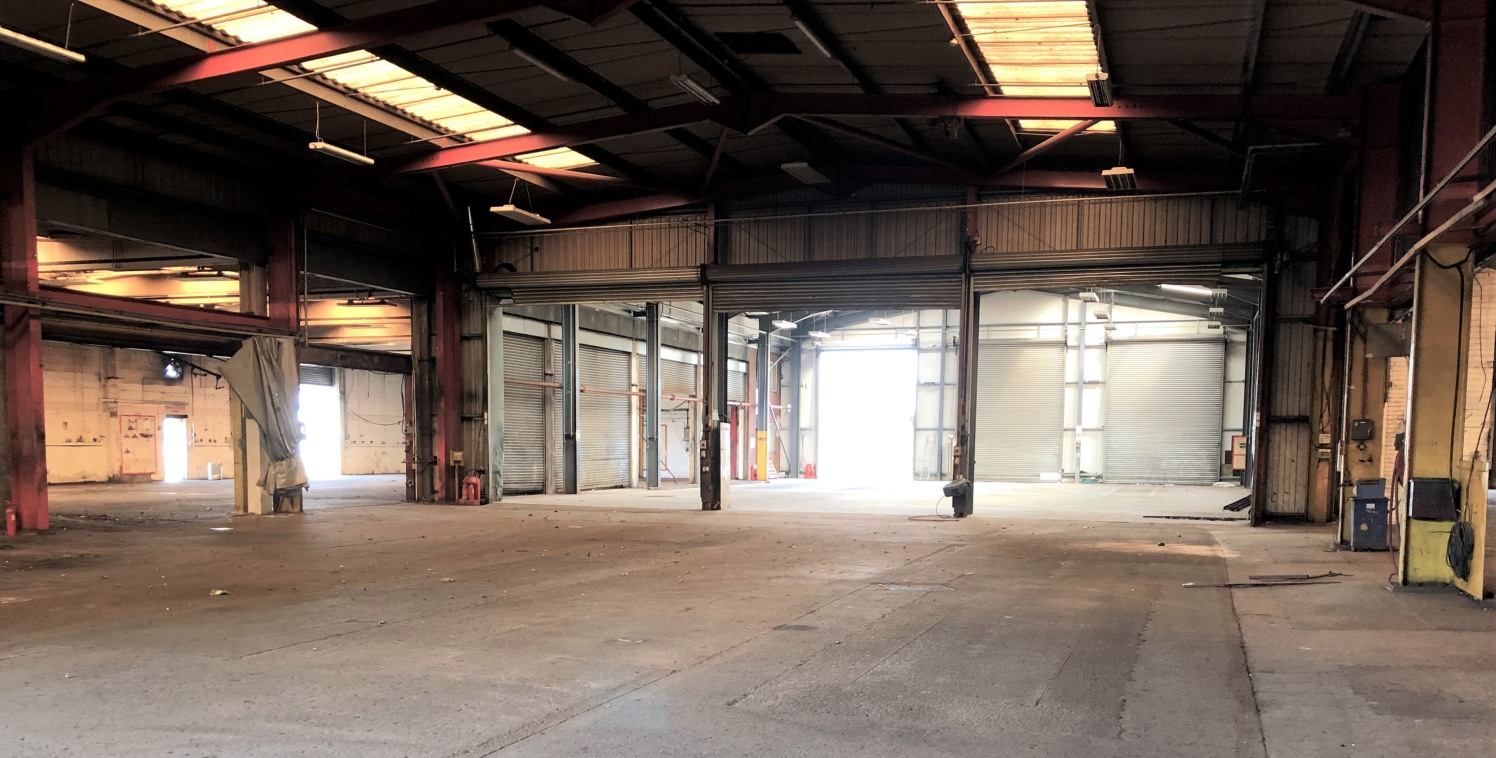 Unit A comprises a detached light industrial/workshop unit constructed of brick elevations surrounding a steel portal frame beneath a mono pitched roof. The property has 3 inspection pits for haulage vehicles. Access is via three full height loading...