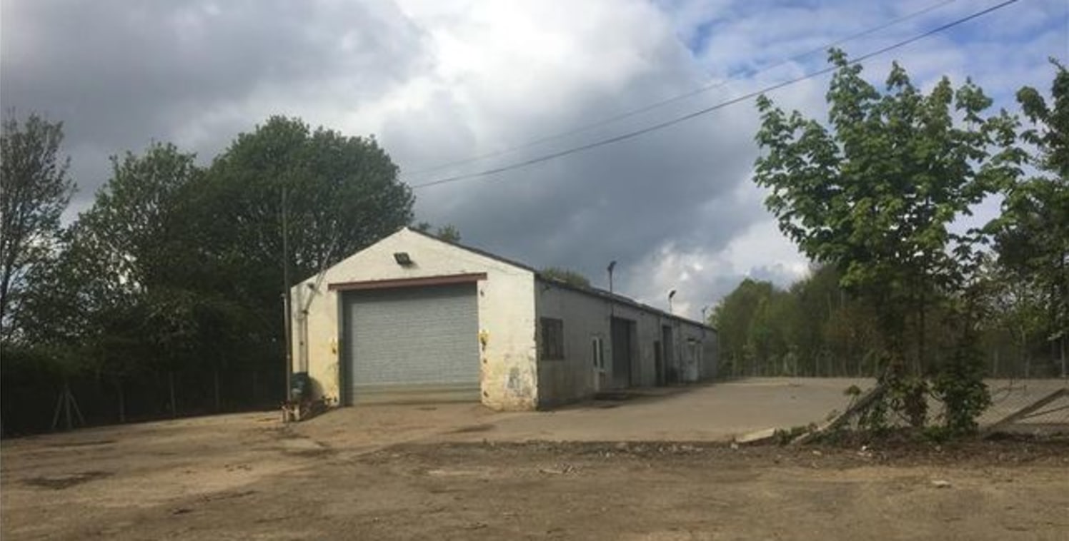 Secure 1.15acre surfaced yard including workshop accommodation with visibility from A14. The workshop is divided into 4 sections and benefits from roller shutter access, 3-phase power supply, offices, kitchen and WCs. The property is available by way...