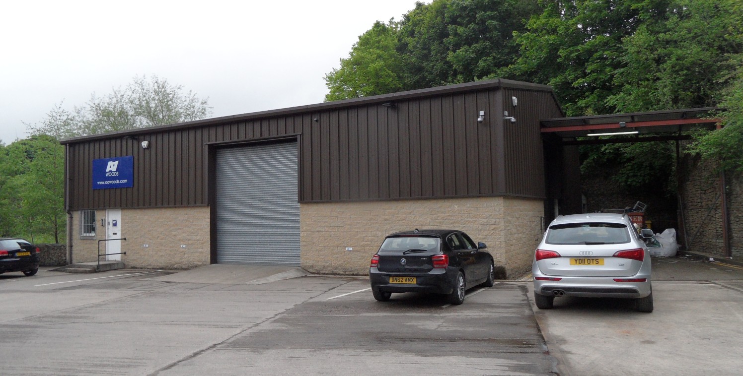 The property comprises a modern detached steel portal framed industrial unit which is constructed from a combination of stone and profiled metal sheet cladding to the front and side elevations and is surmounted by a dual pitched roof which has a prof...