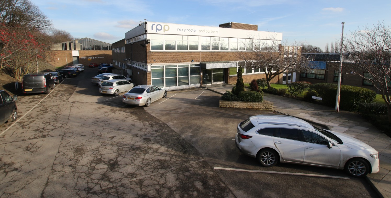 Well located prominent freehold offices on a generous site area. Comprising two linked structures of concrete frame construction underneath pitched and flat roofs. the property is surrounded by well maintained landscaped gardens and tarmac surfaced v...