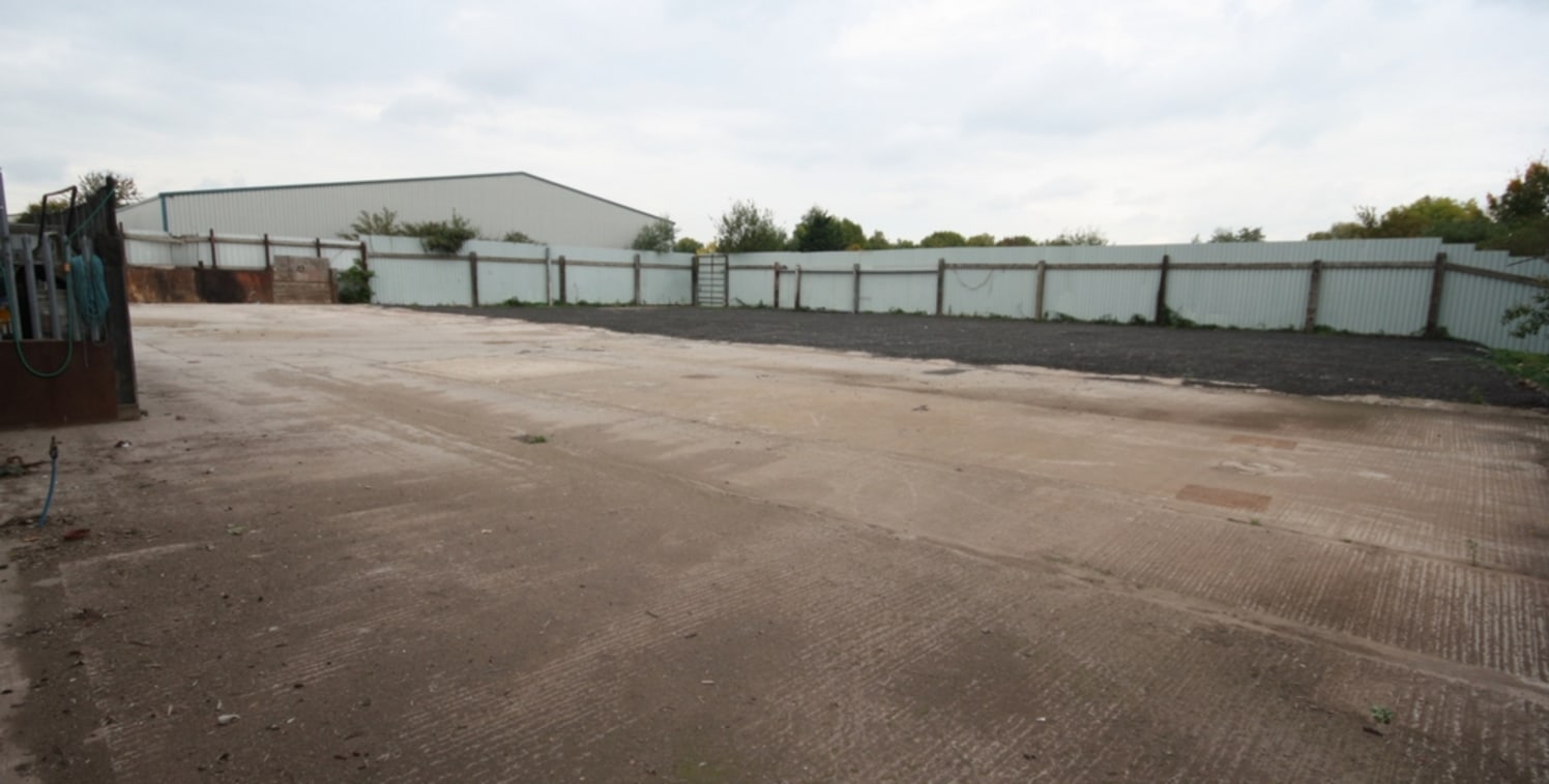 p>\n The yard is located via a set of metal gates and the main entrance part of the yard is concrete slab with a disused weigh bridge to the rear of the yard (not in working order) and a further porta cabin to the right of this. This area measures 8,...