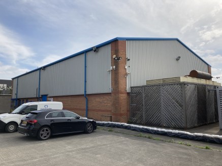 The property comprises a modern detached warehouse unit sat within a generous plot. The property is of steel portal framed construction with brick and composite panel elevations underneath a metal clad roof. Internally the property benefits from mini...