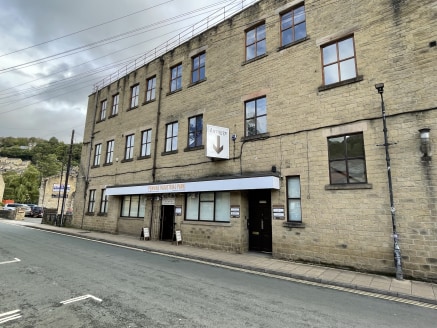 The property comprises a recently refurbished three storey mill building which fronts Valley Road directly opposite Hebden Bridge Health Centre. The office suites form the ground, first and second floors of the building and are accessed via a communa...