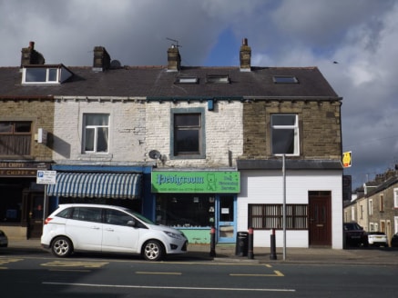 LOCATION\n\nThe property occupies a mid-parade position on Keighley Road which is a short distance from Colne town centre. North Valley Road (A6068), which links to Junction 14 of the M65 motorway is within a short distance drive....