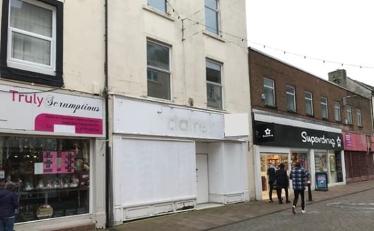 The property comprises three storey, mid terrace prime retail unit providing sales accommodation at ground floor level along with a staff room and WC/kitchen. The property benefits from an extensive glazed frontage incorporating DDA accessibility. In...