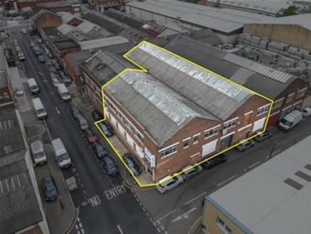 The premises comprise a two storey, steel truss framed warehouse building with a concrete dividing floor and brickwork elevations to a pitched roof. Both floors are of open plan configuration with the benefit of a fully functioning, one ton goods lif...