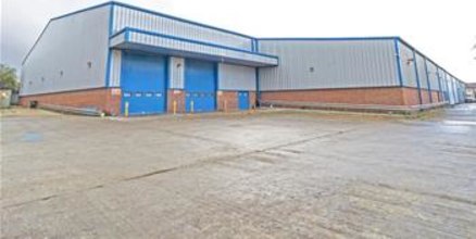 A modern steel portal framed warehouse/distribution facility with a impressive clear eaves height of 7.45m to the main warehouse area rising to 11.41m at the roof apex. Access is gained via two full height up and over loading doors with loading apron...