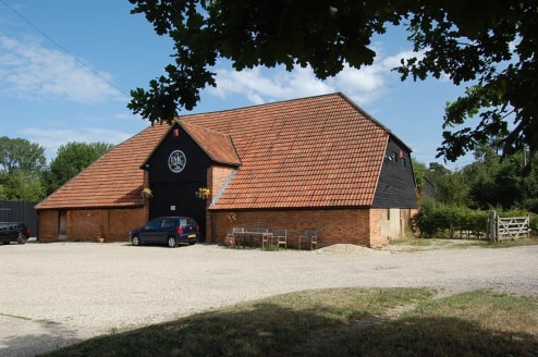 3,500 sq ft\n\nWAREHOUSE / WORKSHOP\n\nBarn\n\n* Fluorescent lighting\n\n* Double loading door\n\n* Concrete floor\n\n* Single phase power\n\n* Security alarm\n\n* Mains water\n\n* Septic tank drainage\n\nOffices\n\n* Carpeting\n\n* Electric heating\...